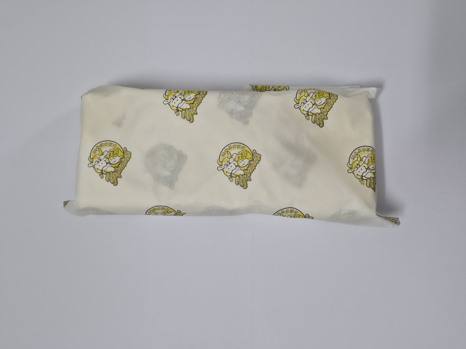 Масло солодковершкове селянське УГРИНІВМОЛОКО 72,5% жиру, 500 г, фасоване